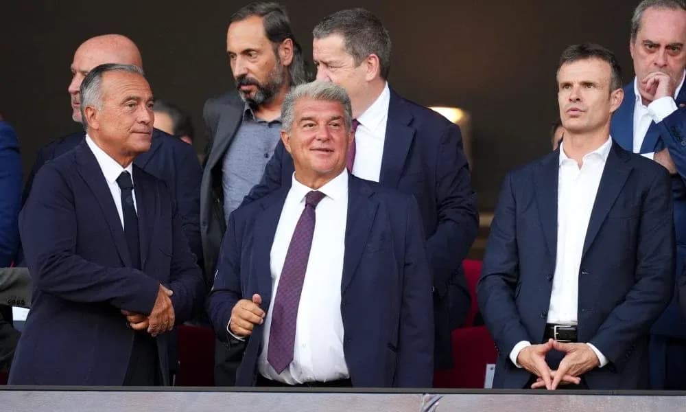 Group of executives watching a match in stadium Group of executives watching a match in stadium