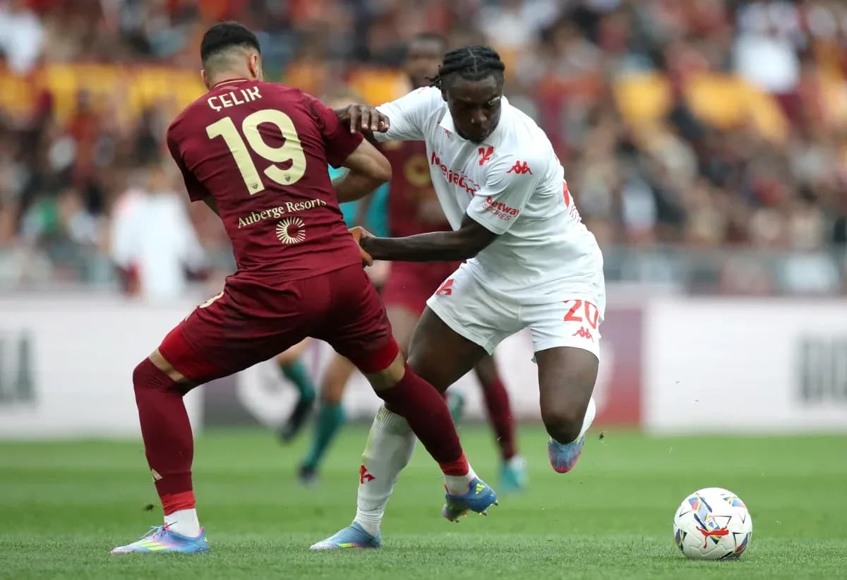 Celik tackling opponent during AS Roma match Celik tackling opponent during AS Roma match