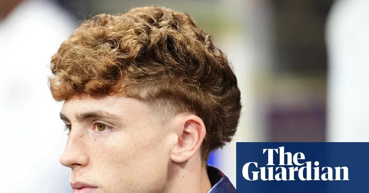 Player with curly hair during a press event Player with curly hair during a press event