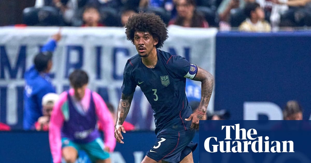 Player wearing USA jersey running on the field Player wearing USA jersey running on the field